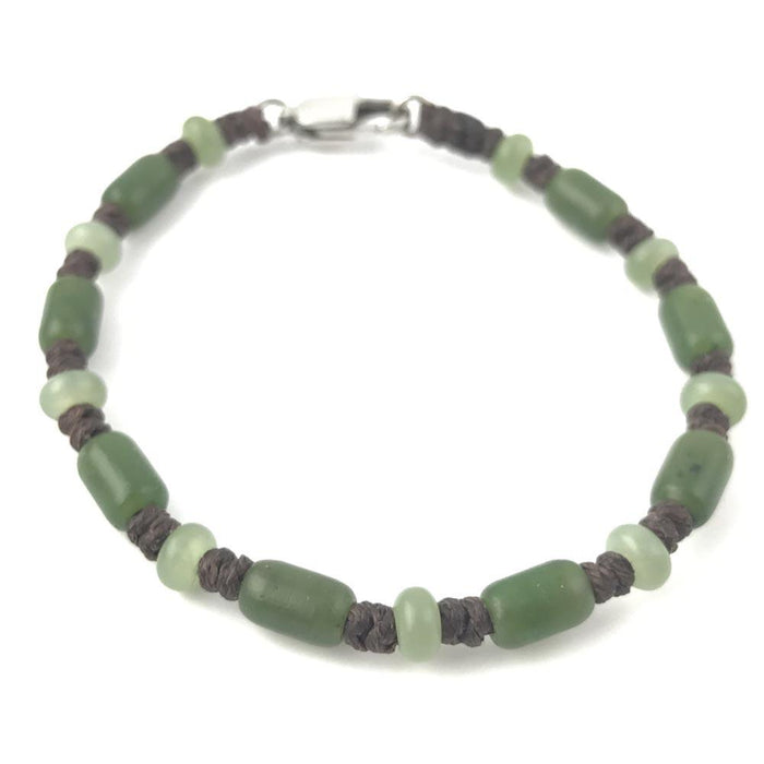 Bracelet 2243-2 with green jade beads and dark brown knotted cord and a silver clasp