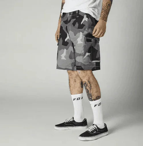 Fox Racing camo board shorts with cargo pockets, paired with Fox socks and Vans shoes for watersports