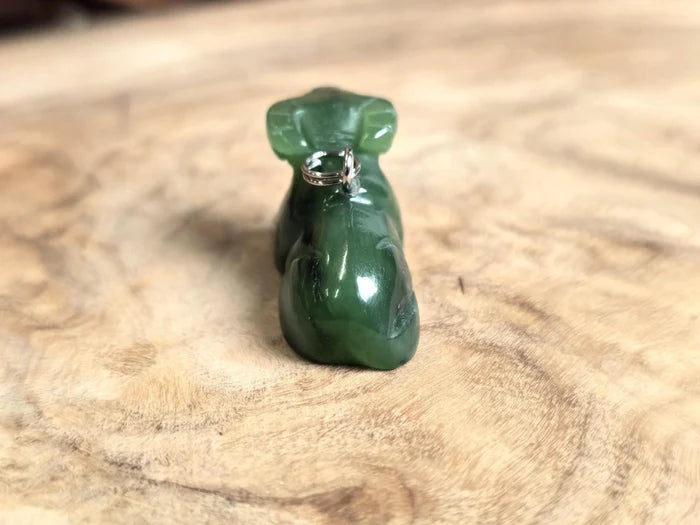 Dark green nephrite jade water buffalo charm with a metal loop bail on top