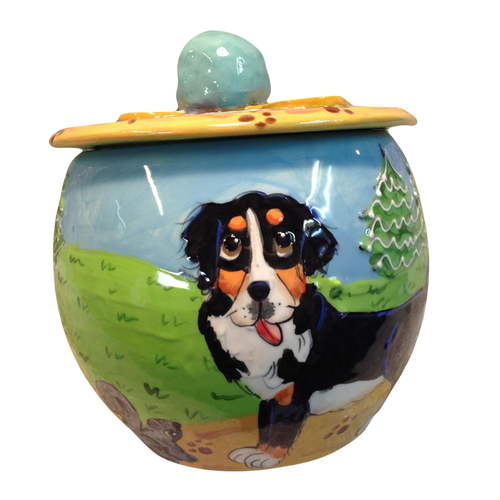 image of Bernese mountain dog on round ceramic treat jar hand painted by faux paw artist Debby Carman custom dog portrayals handmade