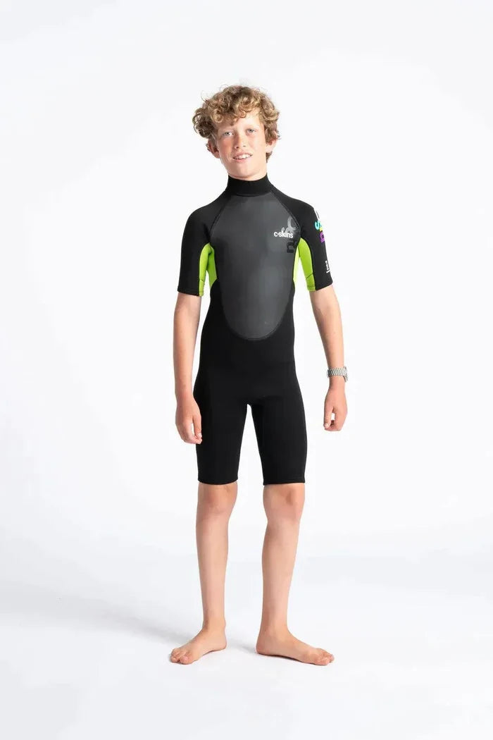 C-Skins Element Junior Kids Shorty Wetsuit in black with neon green panels, front view