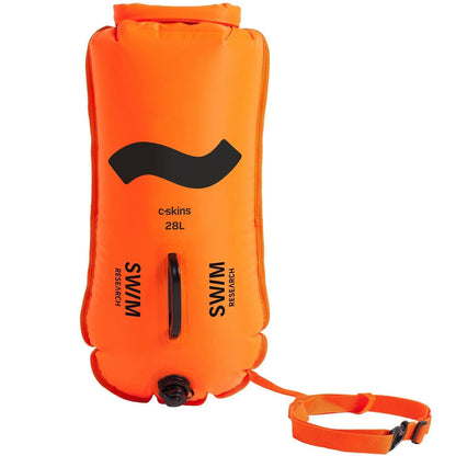 C-Skins Swim Buoy 28L dry bag in bright safety orange with black handle and strap