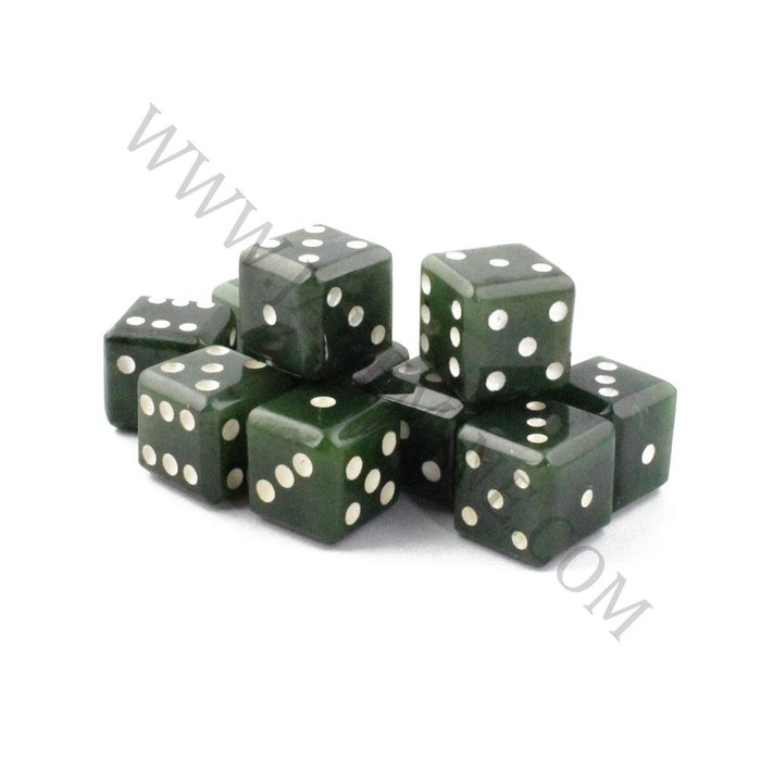 Cluster of green jade dice with white pips on a white background