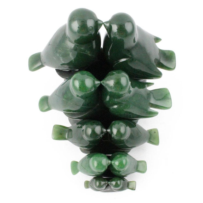 Stacked glossy dark green lovebird figures forming a vertical sculpture