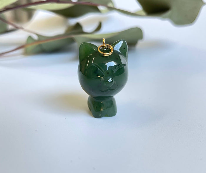 Green cartoon cat charm with a gold loop for necklace