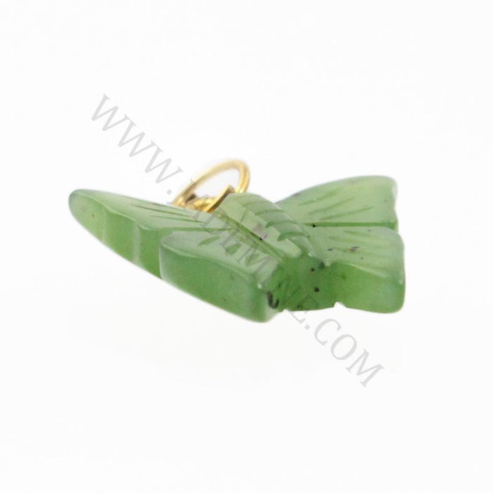 Green butterfly shaped jade charm with a small gold jump ring
