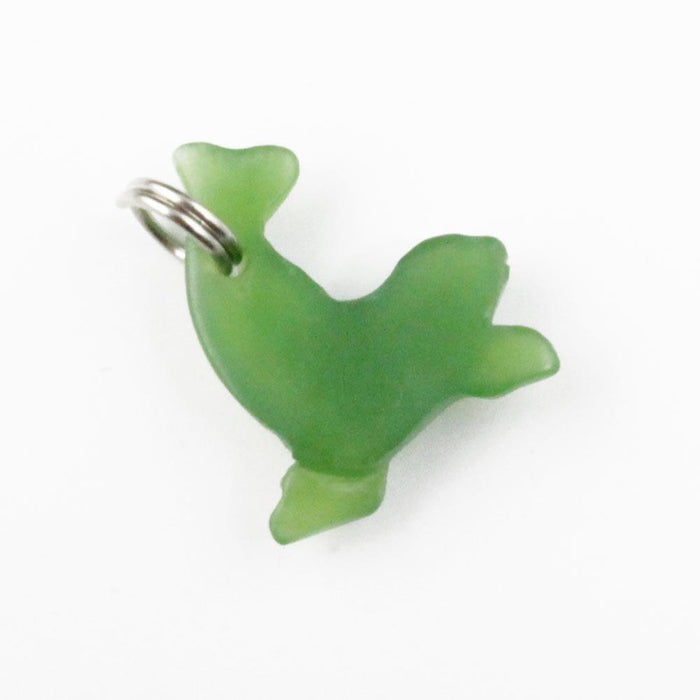 Green seal charm with a silver ring attached for hanging