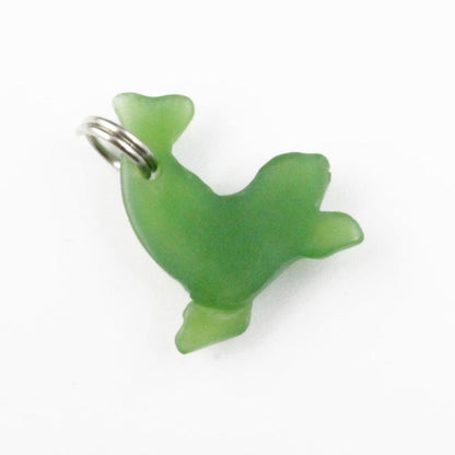 Green seal charm with a silver ring attached for hanging