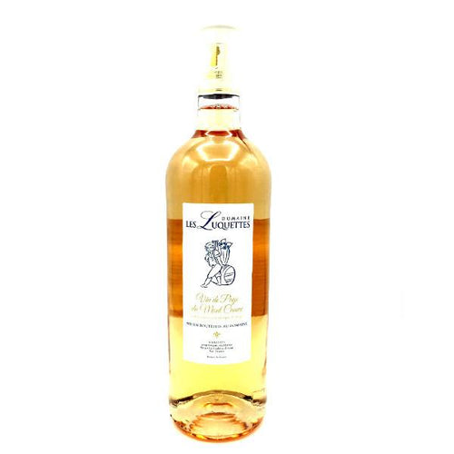 Rose wine bottle with cream label and golden-pink liquid