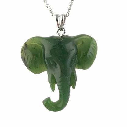 Green jade elephant on a silver chain, white background