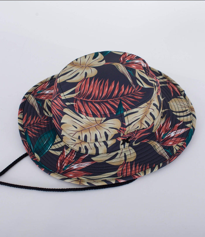 Tropical leaf print bucket hat with black chin strap, ideal for watersports and beachwear