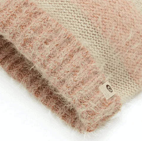 Rip Curl pink and cream knitted beanie with fuzzy texture and brand tag