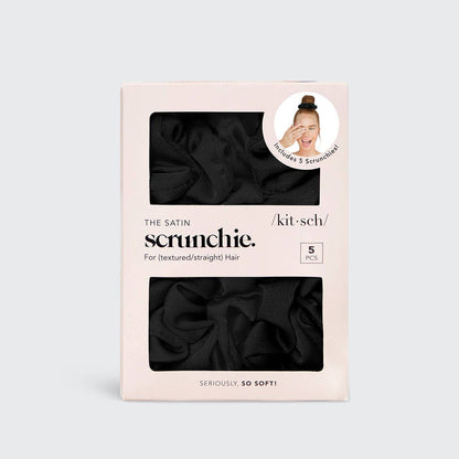 Package of black satin scrunchies with product image on a light gray background