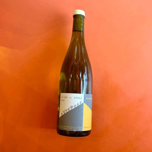 White wine bottle with cream label and gold foil cap